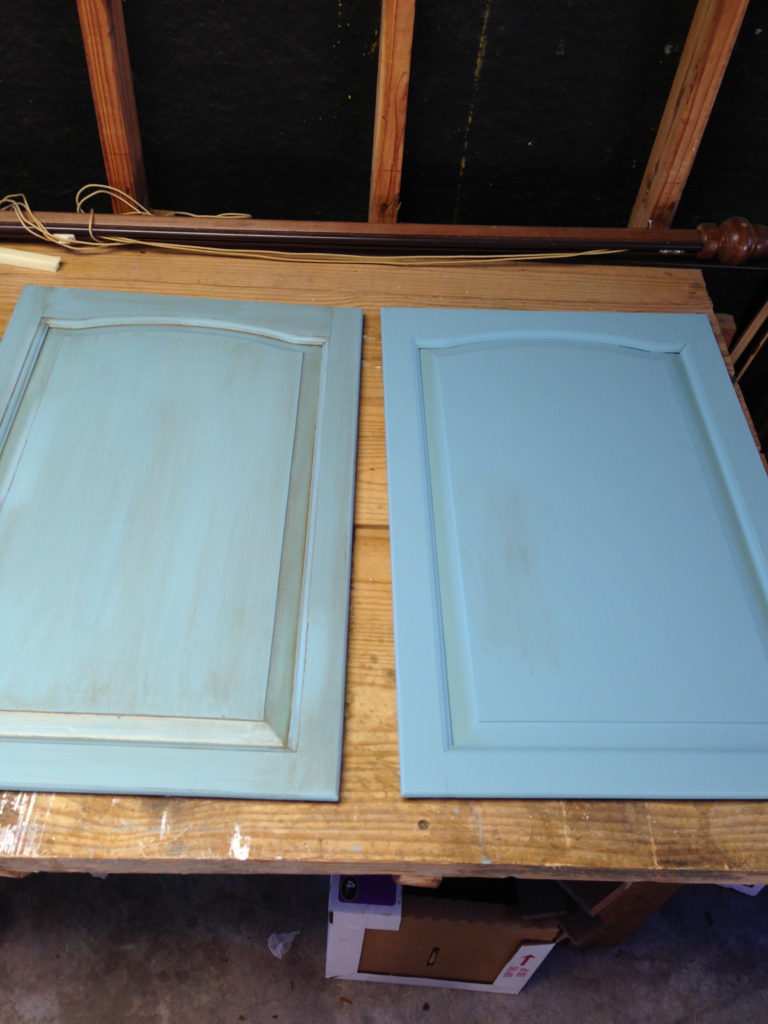The door on the right has two coats of paint. The door on the left has been glazed.