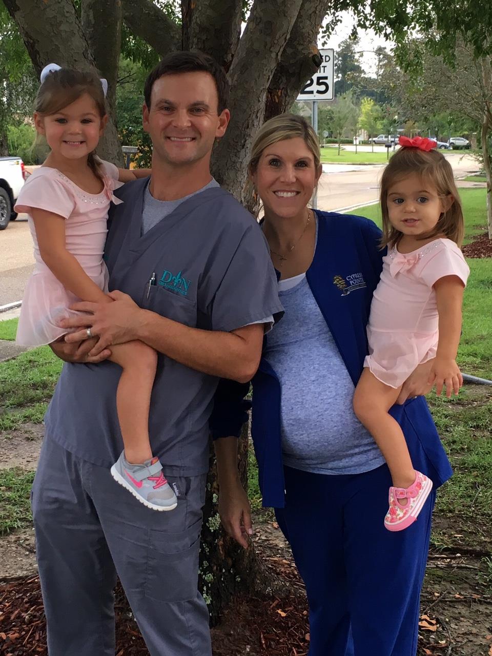 dr duvernay and his family--two daughters and his wife