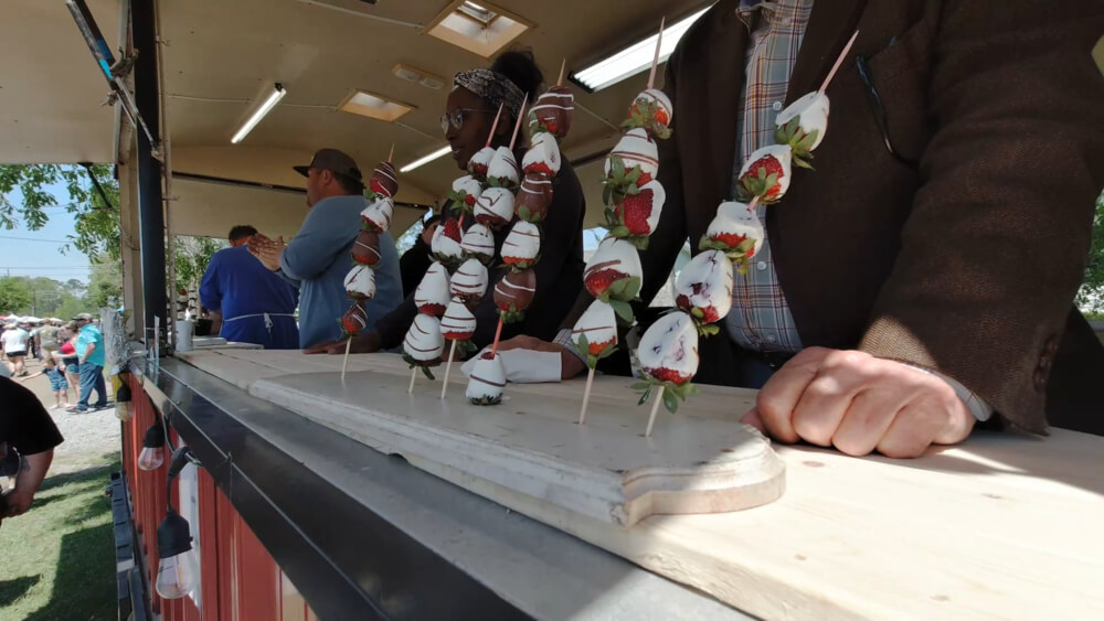 Kebobs of chocolate strawberries on display in a food truck at the Ponchatoula Strawberry Festival. 